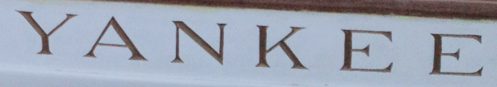 The name YANKEE carved into her transom